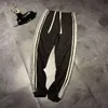 ancient autumn new pattern side webbing splicing sports leisure loose men's and women's pants