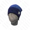 Snöhåror Kvinnor Män Vinter Woolen Caps med kontrollerad stickad Fashion Ski Cap Unisex Brand Skull Caps Warm Hat