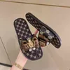 Summer New Bow-Knot Women Shoes Flat Luxury Sandals Metal Designer Slides Fashion Casual Tisters Flip Flops All-Match Wholesale G220518