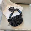 Fanny pakiety koreańskie styl zagraniczny moda moda szerokopasmowa torba na talia Tekstura Tekstura Tassel Damska torba na piersi 220627