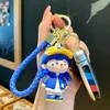 Creative Party Favor Klein voiture bleue porte-clés mignon et délicat garçon fille poupée couple sac petit pendentif en gros