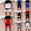 2022 Projektowanie mody Sport Suit TrackSuits T-shirt krótkie 2 sztuki zestawy Solid kolorowy kombinezon wysokiej jakości Suits Men Suits Hip Hop Mens Jogger Niestandardowe logo