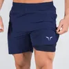 2022 Двойные слои спортивные штаны Quick Drying Running Sport Shorts тренажерный зал тренировочный беговой еду для фитнес -тренировок для MEN69243836714030