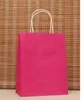 Atacado- 40 pçs / lote Multifunções Rose Pink Papel Saco com alças / 21x15x8cm / Festival Saco de presente / de boa qualidade Shopping Kraft Paper Bags