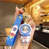 10pcs dessin animé panda astronaute sangles porte-clés sac à main pendentif sangles de téléphone portable tendance 3D basket designer sacs charmes spaceman poupée voiture porte-clés