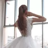 Abiti da sposa eleganti con applicazioni in pizzo Abiti da sposa con strascico staccabile Bottoni con scollo a V senza maniche su misura Vestido de novia