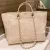 a Women Luxury Handbags Designer Beach Bag Top Quality Fashion Knitting Purse Shoulder Large Tote With Chain Canvas Shopping Bags