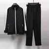 Designer träningsoveraller män set kvinna tech fleece träningsoverall herr sportbyxor märke dragkedja jacka kostymer kvalitet jogger fritidsbyxor Träningsoveraller man byxa Joggers