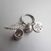 Mini Key Rings Cremation Urn Keychain med vinge och runda taggar för Memorial Ashes Holder Keepsake Dog Cat Pets Human Jewelry Gift 268U