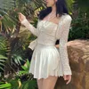 Houzhouセクシーなかわいい白いミニスカートの女性ドローストリングフォールドハイウエスト不規則なフリルパッチワークフェアコアショートスカートモリガール220701