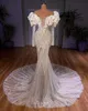 Robes de mariée de luxe sirène 2022 robes de mariée hors de l'épaule volants à manches longues perlée cristal balayage train Robe de mari￩e