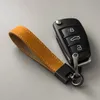 Chave -chave do carro Chave de couro genuíno Chave de fivela pura colorida carr anel de anel de anel de acessórios do carro presente