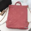 Sac à dos en cuir véritable à double usage pour femmes de luxe grande capacité carré Totes design sacs à dos à cordon avec mini lettre rétro sac en métal