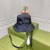 Designers bucket hat fashion klassieke vissershoeden kunnen aan beide kanten gedragen worden voor mannen en vrouwen. Het is geweldig om te combineren met krimpband voor zeer goede schaduw