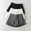 Gonne estive a vita alta Mini gonne sexy da donna Gonna a pieghe vintage Gonne da tennis coreane Corte Bianco Nero 220701