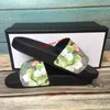 Designer feminino desliza homens chinelos sandálias de luxo marcas sandálias floral floral engrenagem plana de couro bot de borracha chinelos casuais verão