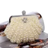 Lyxkvällspåsar Ny modeskal design kvinnor pärlstav handgjorda diamanter chan axel messenger crystal bröllop handväska 230509bj