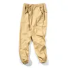 Мужские штаны Хип -хоп бегут грузоподъемность в гареме повседневные многопокварные брюки STHATEAR STREED STAWEAR S 5XL 220827
