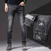 Slim Marque Jeans Hommes Petits Pieds Trous Légers Tube Droit Automne et Hiver Élastique Mode Coréenne