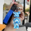 2022 Acrylic stripe stand pose bear keychain creative car bag couple bear key chain small pendant wholesale