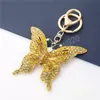 Butterfly Keychains автомобиль Ключ Кольца Держатель Женщины Мода Кристалл Горный Хрусталь Сумка Подвеска Подвески ОДВ Нарученные Украшения Подарочные Клейкие Цепи Сумки Аксессуары