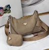 Borsa da donna Designer di lusso Borse in nylon con lettere Borsa a tracolla hobo in tela all'ingrosso signora Tote catene borse borse messenger prad 3 Pie 1