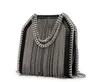 Wysokiej jakości luksusowe torebki kobiety designerskie łańcuchy w stylu punkowym torba na ramiona małe nitor