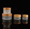 Garrafas de embalagem boné de bambu Creme de vidro fosco redondo frascos de cosméticos Manam de rosto 15g-30g-50g jar com revestimentos internos de PP SN4401