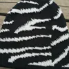 ビーニー/スカルキャップビジュアルアクスルラグジュアリー冬の帽子ゼブラパターン女性のための帽子を編むファッションウォームスカリービーニーレディースカジュアルカバーヘッド
