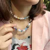 Chokers etnische mode 2022 Multicolor hart kralen Imitatie Parels Choker ketting vrouwen Boheemse zoete bloem hanger halve nekkenschakelaars sidn