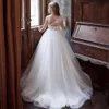 2022 Vintage Sheer Jewel Lace Appliques Tulle First Communion Robe Robe Robe à manches longues Robes de fille de fleur avec perles