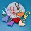 Breien liefde sleutelhanger handgemaakte gebreide hartbloem met bel hangende hanger sleutelhanger vrouwen cadeauzakje charme sleutelhanger houder