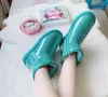 uggskid designer australiensiska klassiska clear mini stövlar australien kvinnor kvinnor vinter snö päls purry flickor barn män satin boot ankel tossor snöar halv knä kort yu888