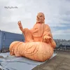 Grote opblaasbare Boeddha 5m Gepersonaliseerde opgeblazen zittende Arhat Stone -standbeeld voor het boeddhisme -evenement