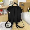 Bolsas ao ar livre Moda Mulheres Mochila japonesa Bolsa escolar fofa de pingente para meninas Nylon Backbag da tendência à prova d'água da tendência