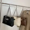 Mode kvinnors handväskor 2022 nya totes messenger väska grossist personlighet rombplid pu stor kapacitetskedja klaff axel retro
