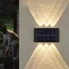 Luzes solares da parede LED ao ar livre Luz branca quente para cima e para baixo Lâmpadas solares à prova d'água para o pátio do jardim Caminho da garagem da garagem