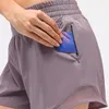 L-091 Hot Low Rise Breathable Quick-Dry Yoga Shorts Ingebouwde sport Korte Verborgen Zipper Side Drop-In Pockets Running Tweezakken met continu Drawcord