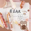 Gel Pens PCS/Lot Kawaii Caramel Pudding Bear Black Ink Mechanical Pen School School Supply Supplyery Cute Gip Gowsgel