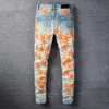 Pantalones vaqueros para hombre América hombre azul naranja estrella cuero Patchwork agujero reparación Streetwear Jean moda rasgado hombres motocicleta pantalón