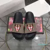 Męskie projektanci Slajdy Kapcia Damskie Moda Luxury Kwiat Slipper Gumowe mieszkanie Sandały Sandały Letnie buty na plaży Mokasyna