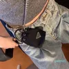 2022 fille Mini portefeuilles sacs d'écouteurs de luxe chaîne de matériel en argent pochette en toile de nylon femmes porte-monnaie mode noir clé bag191G
