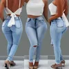 Damenjeans Hellblaue dünne Bleistifthosen für Frauen Hohe Taille Ripped Holes Denim-Hose Frau 2022 Mode elastische Jean Plus Size