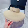 أزياء أقنعة من القش Sunhat شريط مرن فاخر مصمم قناع النساء القبعات قبعات قبعة بحافة عالية الجودة قبعة واسعة حافة الصيف عالية الجودة