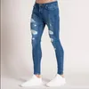 Mäns jeans herrbyxor 2022 Fall White Ripped European och American Black Slim High midjekläder
