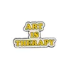 Englische Brosche Kunst ist Therapie ist der kreative Text des Metallabzeichens