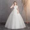 Andra bröllopsklänningar Ankomst Ezkuntza Kort ärm klänning spetsar o-hals upp bollklänning prinsessan vintage klänningar annan