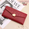 Real Cow Leather Long Thin Minority Wallet Women's New Style Small Handbag för mobiltelefon Stor plånbok 220625