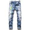 Jeans pour hommes Coupe ajustée avec trous et patch Peinture élastique Splash Blue Couture Pantalon de mendiant pour hommes