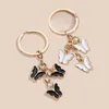 Femmes Metal Butterfly Key Chains Handbag Purse Pendant Couette mignonne pour sacs à main